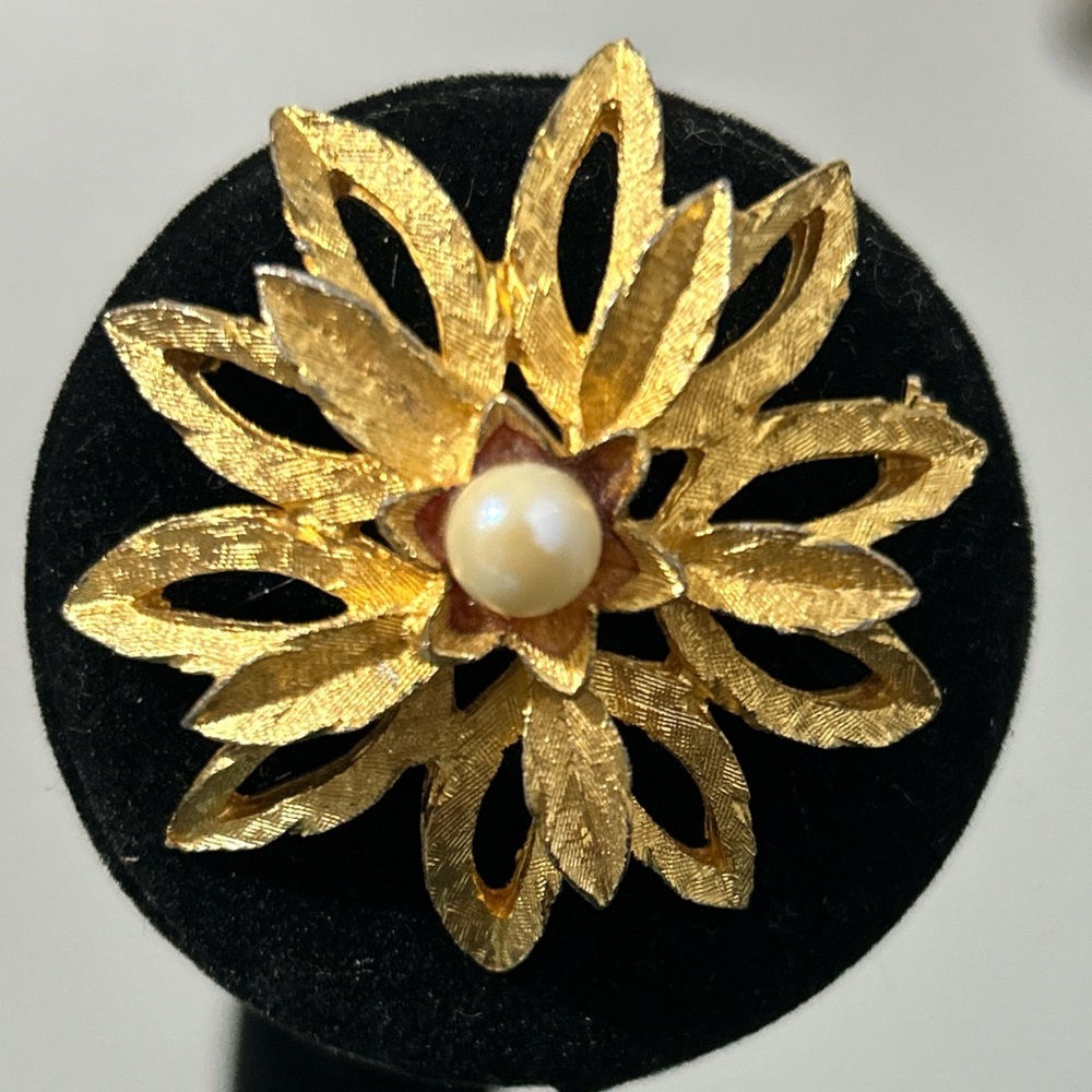 Elegant Gold and White Brooch with Pearl Center